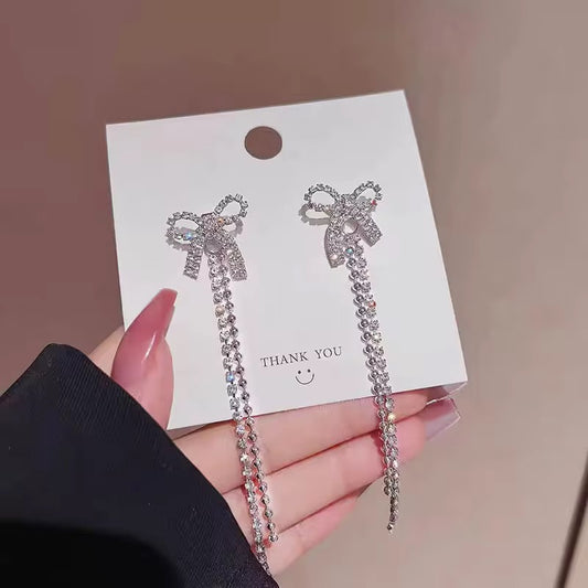 Diamond bow earrings
